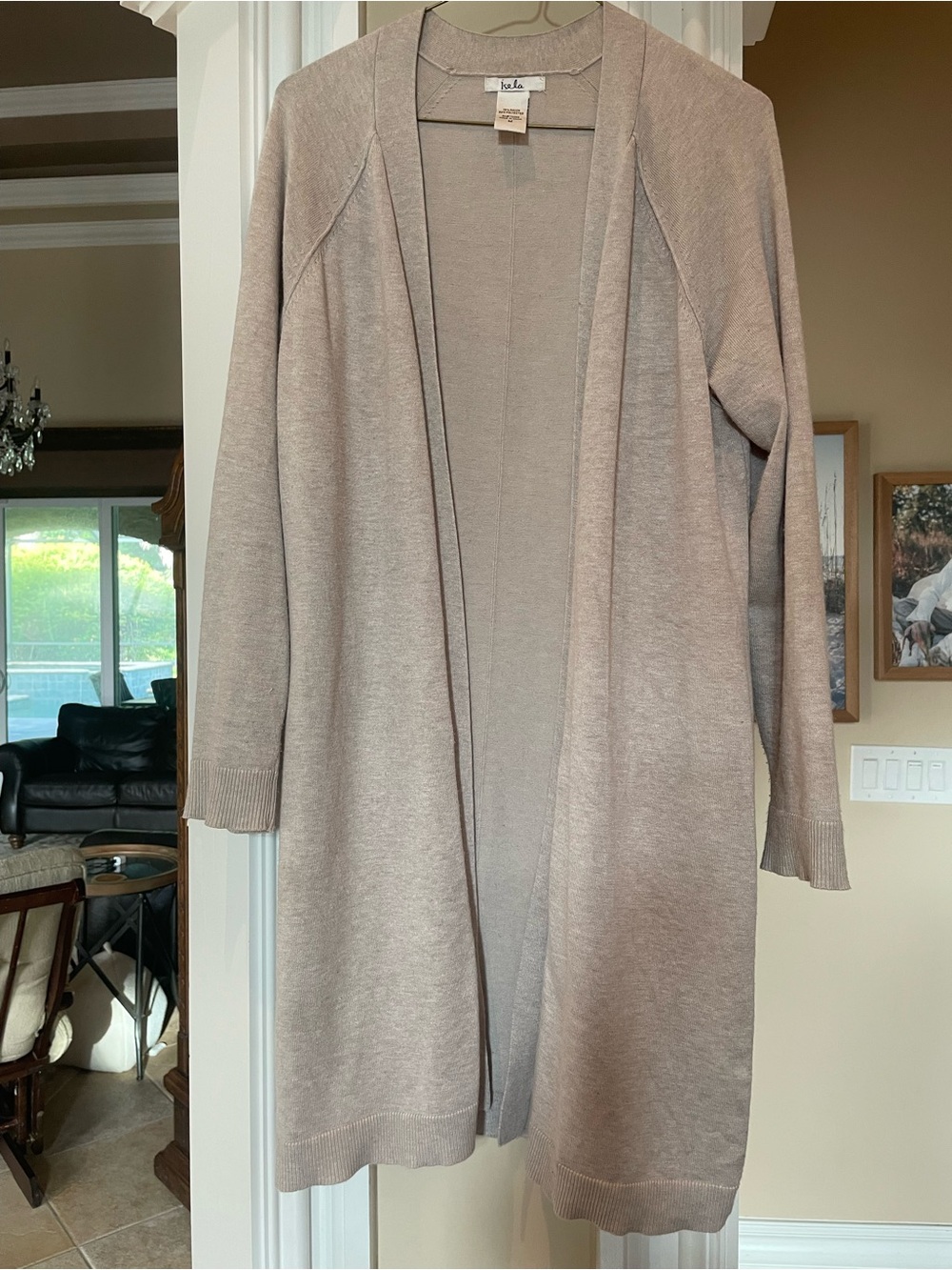 Soft beige long open-front cardigan